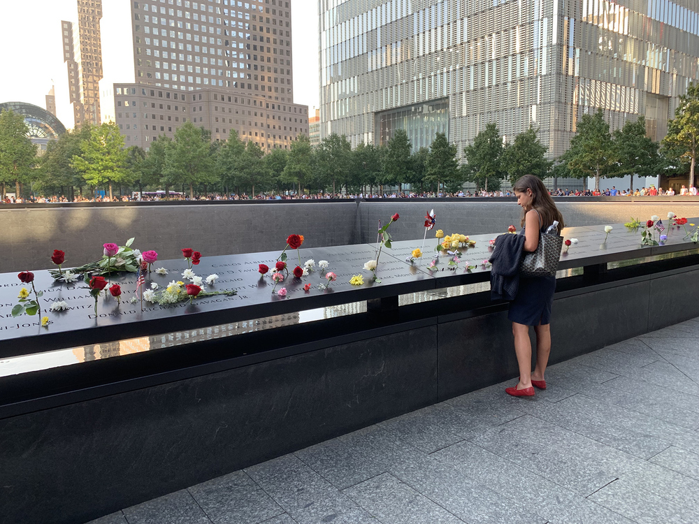 New York, NY, USA September 10 A women contemplates at the 911 Memorial, honoring those killed at the September 11 attacks on the World Trade Center in New York City